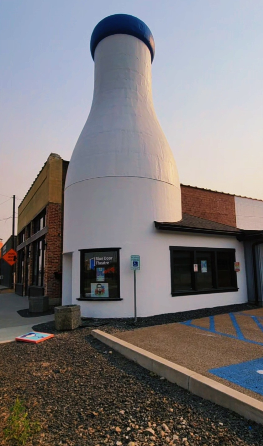 The Blue Door Theatre Milk Bottle